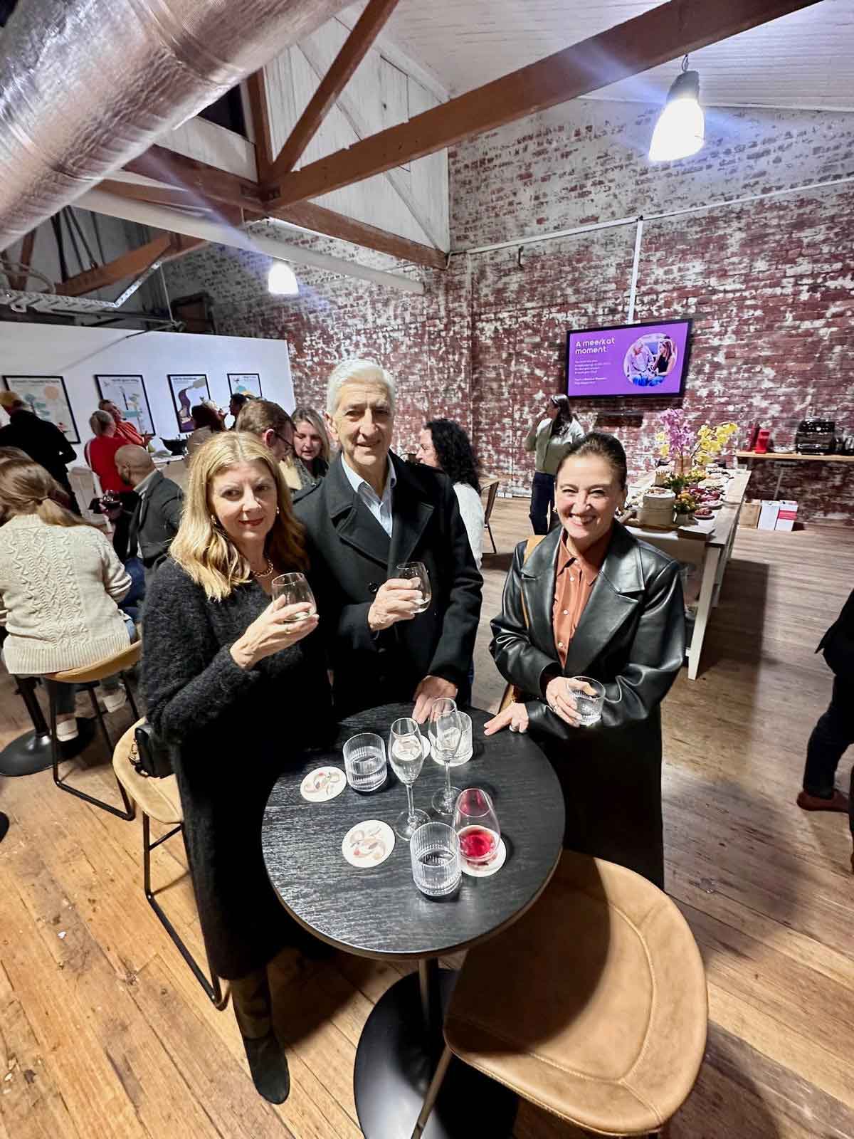 People gathered at ko&co's launch night in South Melbourne, enjoying drinks and conversation