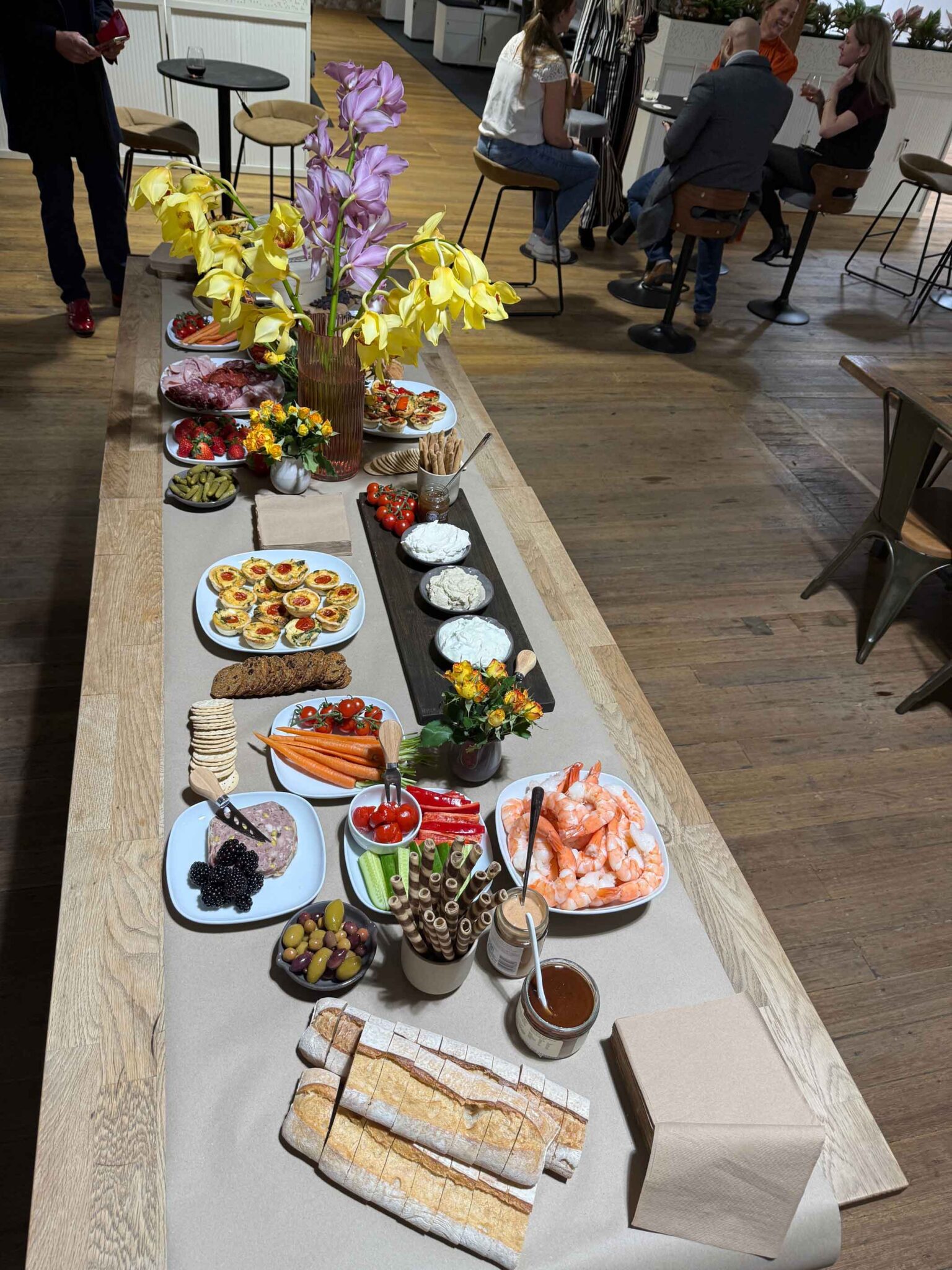 Flat lay photo of ko&co grazing table with cheeses, crackers, fruits and dips